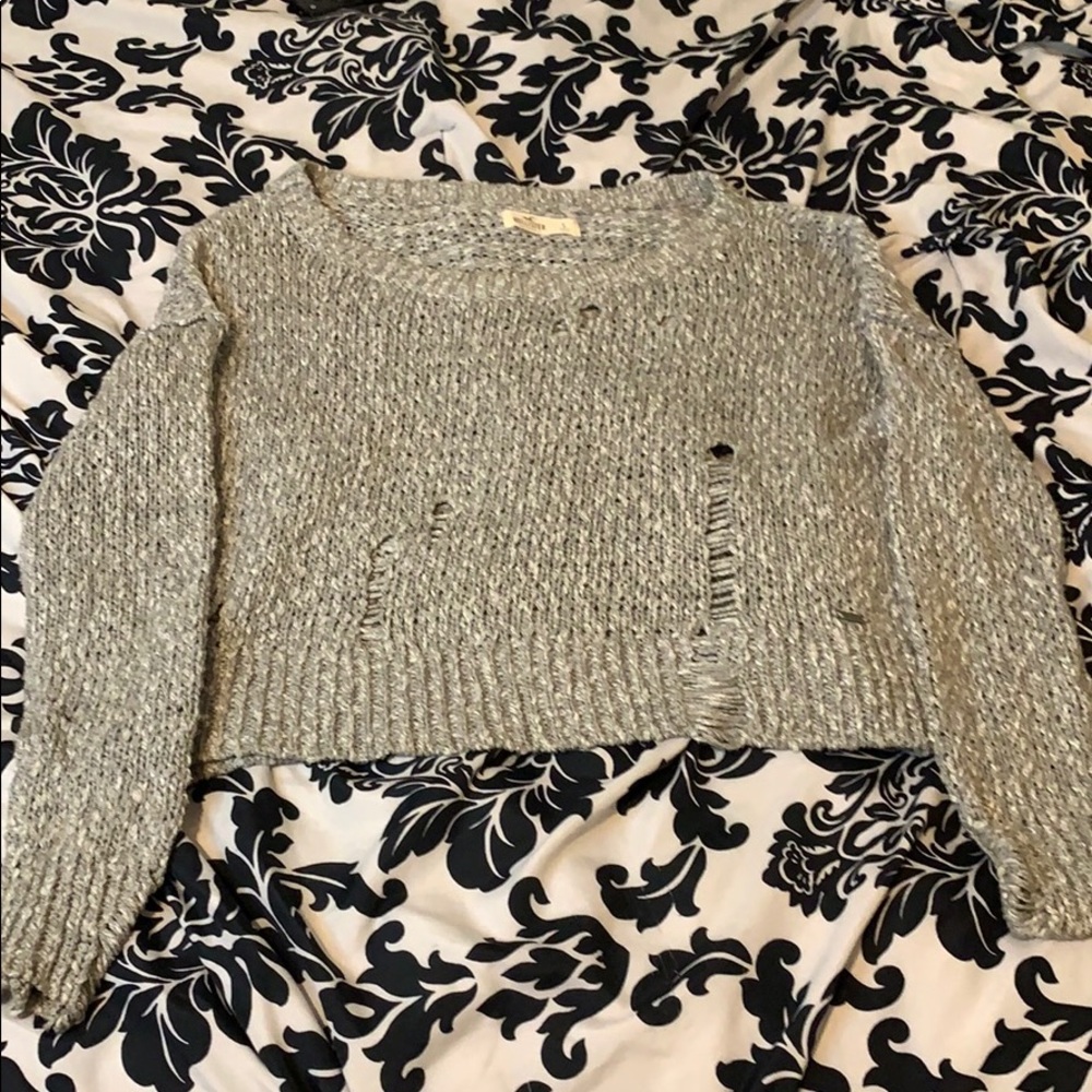 Cropped, ripped sweater
